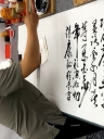 黄锦青先生题写“岳飞网”、书写“满江红”